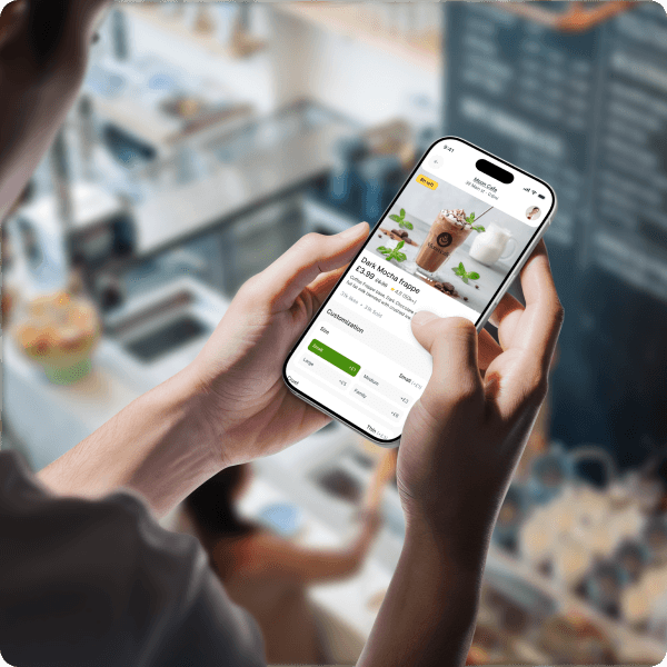 Person holding phone with Aulax app